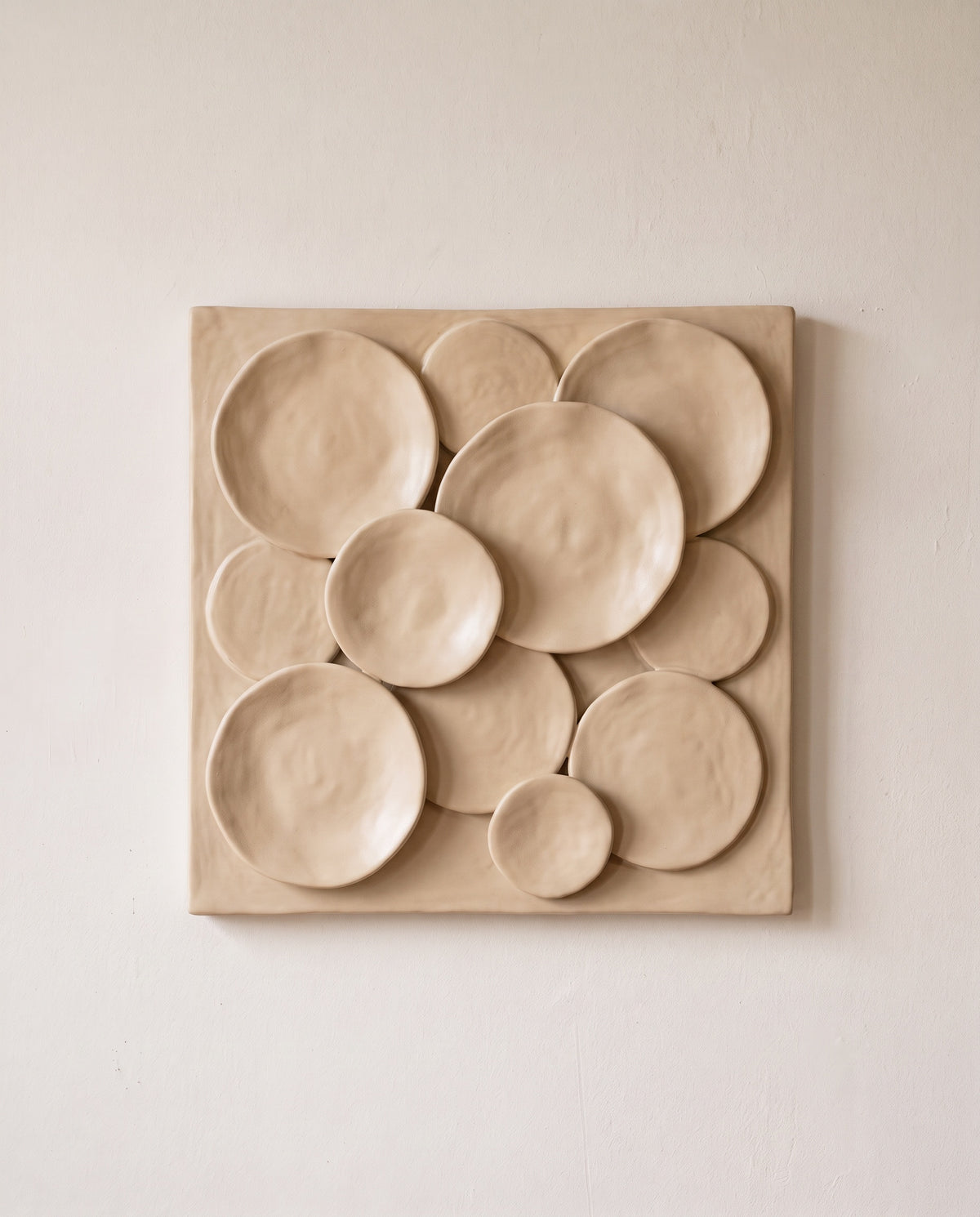 Hand-Formed Ceramic Wall Relief in Sand