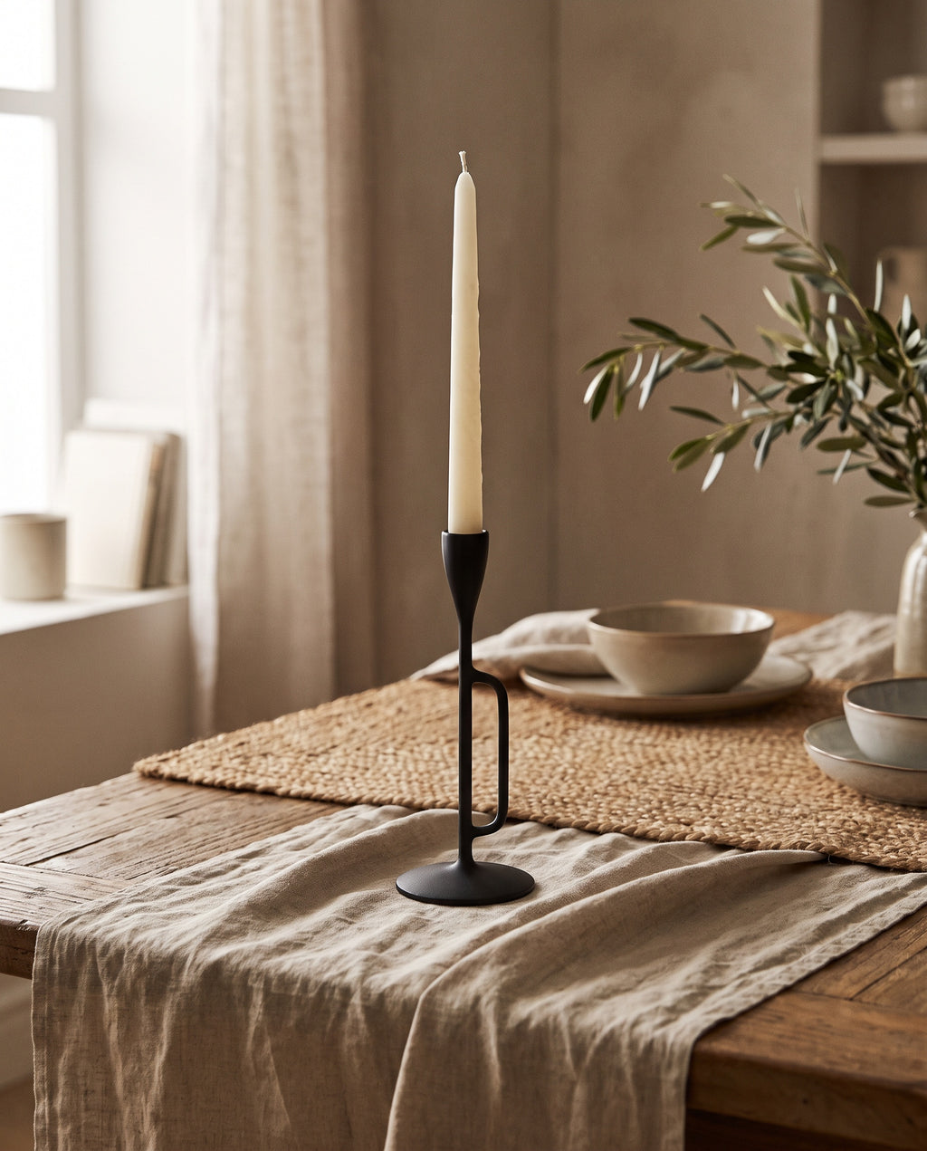 Sculptural Black Metal Candlestick styled at home